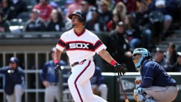 Apr 27, 2014; Chicago, IL, USA; Chicago White Sox designated hitter Jose Abreu hits a two-run home run against the Tampa Bay Rays during the sixth inning at U.S Cellular Field. Mandatory Credit: Jerry Lai-USA TODAY Sports