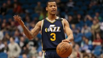 Mar 30, 2015; Minneapolis, MN, USA; Utah Jazz guard Trey Burke (3) dribbles in the fourth quarter against the Minnesota Timberwolves at Target Center. The Utah Jazz beat the Minnesota Timberwolves 104-84. Mandatory Credit: Brad Rempel-USA TODAY Sports