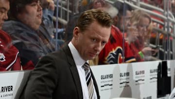 GLENDALE, AZ - FEBRUARY 22: Head Coach Glen Gulutzan of the Calgary Flames looks on from the bench against the Arizona Coyotes at Gila River Arena on February 22, 2018 in Glendale, Arizona. (Photo by Norm Hall/NHLI via Getty Images)