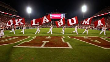 NORMAN, OK - SEPTEMBER 16: Members of the Oklahoma Sooners spirit squad celebrate a touchdown against the Tulane Green Wave at Gaylord Family Oklahoma Memorial Stadium on September 16, 2017 in Norman, Oklahoma. Oklahoma defeated Tulane 56-14. (Photo by Brett Deering/Getty Images) *** Local Caption ***