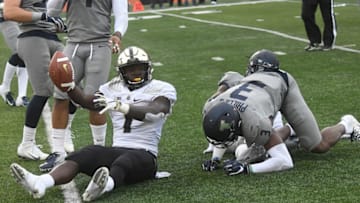 CHAMPAIGN, IL - OCTOBER 13: Purdue Boilermakers running back D. J. Knox (1) reacts after a short run during a Big Ten Conference college football game between the Purdue Boilermakers and the Illinois Fighting Illini on October 13, 2018, at Memorial Stadium, Champaign, IL. Purdue won, 46-7. (Photo by Keith Gillett/Icon Sportswire via Getty Images)