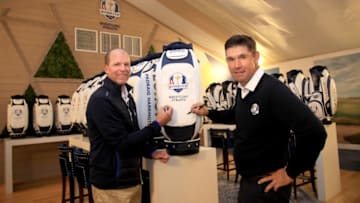 KOHLER, WISCONSIN - OCTOBER 01: United States Captain Steve Stricker (L) and European Captain Padraig Harrington (R) sign Ryder Cup memorabilia during the Ryder Cup 2020 Year to Go media event at Whistling Straits Golf Course on October 1, 2019 in Kohler, United States.. (Photo by Andrew Redington/Getty Images,)