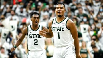 Michigan State's Pierre Brooks, right, celebrates his 3-pointer with teammate Tyson Walker during the first half in the game against Louisville on Wednesday, Dec. 1, 2021, at the Breslin Center in East Lansing.211201 Msu Lville 096a