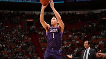 MIAMI, FL - MARCH 5: Devin Booker #1 of the Phoenix Suns shoots a free throw against the Miami Heat on March 5, 2018 at American Airlines Arena in Miami, Florida. NOTE TO USER: User expressly acknowledges and agrees that, by downloading and or using this Photograph, user is consenting to the terms and conditions of the Getty Images License Agreement. Mandatory Copyright Notice: Copyright 2018 NBAE (Photo by Issac Baldizon/NBAE via Getty Images)