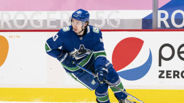 VANCOUVER, BC - MARCH 22: Quinn Hughes #43 of the Vancouver Canucks skates during NHL action against the Winnipeg Jets at Rogers Arena on March 22, 2021 in Vancouver, Canada. (Photo by Rich Lam/Getty Images)