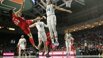 MIAMI, FLORIDA - NOVEMBER 05: Jordan Nwora #33 of the Louisville Cardinals attempts a shot against the Miami Hurricanes during the second half at Watsco Center on November 05, 2019 in Miami, Florida. (Photo by Michael Reaves/Getty Images)