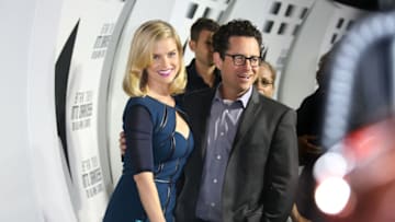 LOS ANGELES, CA - SEPTEMBER 10: Actress Alice Eve (L) and J. J. Abrams, director/writer/producer, attend "Star Trek Into Darkness" Blu-ray/DVD Release Event at the California Science Center on September 10, 2013 in Los Angeles, California. (Photo by Frederick M. Brown/Getty Images)