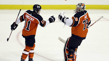 Apr 15, 2021; Pittsburgh, Pennsylvania, USA; Philadelphia Flyers right wing Travis Konecny (11) and goaltender Carter Hart (79) celebrate after defeating the Pittsburgh Penguins in a shootout at PPG Paints Arena. The Flyers won 2-1 in a shootout. Mandatory Credit: Charles LeClaire-USA TODAY Sports