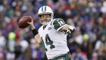 Jan 3, 2016; Orchard Park, NY, USA; New York Jets quarterback Ryan Fitzpatrick (14) throws a pass during the second half against the Buffalo Bills at Ralph Wilson Stadium. Bills beat the Jets 22 to 17. Mandatory Credit: Timothy T. Ludwig-USA TODAY Sports