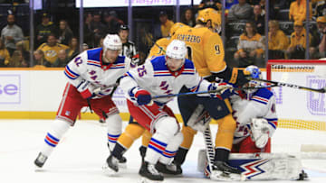 NASHVILLE, TN - NOVEMBER 02: New York Rangers winger Brendan Smith (42), defenseman Libor Hajek (25) and goalie Alexandar Georgiev (40) defend against Nashville Predators left wing Filip Forsberg (9) and right wing Viktor Arvidsson (33) during the NHL game between the Nashville Predators and New York Rangers, held on November 2, 2019, at Bridgestone Arena in Nashville, Tennessee. (Photo by Danny Murphy/Icon Sportswire via Getty Images)