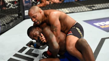 BUFFALO, NY - APRIL 08: Daniel Cormier takes down Anthony Johnson in their UFC light heavyweight championship bout during the UFC 210 event at KeyBank Center on April 8, 2017 in Buffalo, New York. (Photo by Josh Hedges/Zuffa LLC/Zuffa LLC via Getty Images)