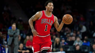 Feb 20, 2015; Auburn Hills, MI, USA; Chicago Bulls guard Derrick Rose (1) brings the ball up court against the Detroit Pistons during the first quarter at The Palace of Auburn Hills. Mandatory Credit: Tim Fuller-USA TODAY Sports