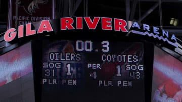 Dec 16, 2014; Glendale, AZ, USA; The scoreboard shows the time left in overtime after a goal by Arizona Coyotes defenseman Oliver Ekman-Larsson (23) to beat the Edmonton Oilers 2-1 at Gila River Arena. Mandatory Credit: Matt Kartozian-USA TODAY Sports