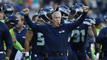 Sep 11, 2016; Seattle, WA, USA; Seattle Seahawks head coach Pete Carroll reacts to a third down stop against the Miami Dolphins during the third quarter at CenturyLink Field. Seattle defeated Miami, 12-10. Mandatory Credit: Joe Nicholson-USA TODAY Sports