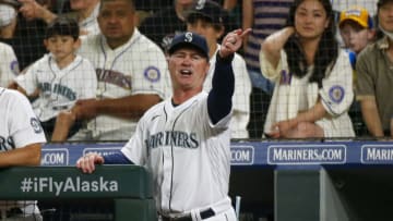 Jul 26, 2021; Seattle, Washington, USA; Seattle Mariners manager Scott Servais (9) reacts to a batter being hit by a pitch against the Houston Astros during the eighth inning at T-Mobile Park. Mandatory Credit: Joe Nicholson-USA TODAY Sports