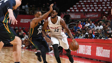 LAS VEGAS, NV - JULY 10: Derrick Walton Jr., #14 of the Miami Heat handles the ball against the Utah Jazz during the 2018 Las Vegas Summer League on July 9, 2018 at the Thomas & Mack Center in Las Vegas, Nevada. NOTE TO USER: User expressly acknowledges and agrees that, by downloading and or using this Photograph, user is consenting to the terms and conditions of the Getty Images License Agreement. Mandatory Copyright Notice: Copyright 2018 NBAE (Photo by Garrett Ellwood/NBAE via Getty Images)