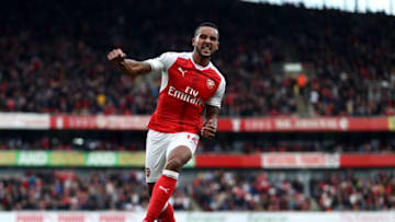 LONDON, ENGLAND - OCTOBER 15: Theo Walcott of Arsenal celebrates scoring his sides second goal during the Premier League match between Arsenal and Swansea City at Emirates Stadium on October 15, 2016 in London, England. (Photo by Julian Finney/Getty Images)