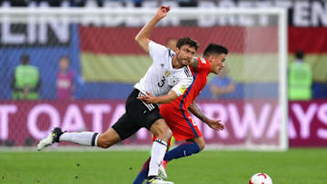 SAINT PETERSBURG, RUSSIA - JULY 02: Charles Aranguiz of Chile and Jonas Hector of Germany compete for the ball during the FIFA Confederations Cup Russia 2017 Final between Chile and Germany at Saint Petersburg Stadium on July 2, 2017 in Saint Petersburg, Russia. (Photo by Buda Mendes/Getty Images)