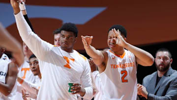 KNOXVILLE, TN - FEBRUARY 21: Grant Williams #2 and Derrick Walker #15 of the Tennessee Volunteers react after a three-point basket against the Florida Gators in the second half of a game at Thompson-Boling Arena on February 21, 2018 in Knoxville, Tennessee. Tennessee won 62-57. (Photo by Joe Robbins/Getty Images)