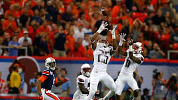 ATLANTA, GA - SEPTEMBER 05: Josh Harvey-Clemons #25 of the Louisville football program intercepts this pass intended for Ricardo Louis #5 of the Auburn Tigers at Georgia Dome on September 5, 2015 in Atlanta, Georgia. (Photo by Kevin C. Cox/Getty Images)