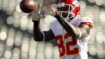 Dec 15, 2013; Oakland, CA, USA; Kansas City Chiefs wide receiver Dwayne Bowe (82) catches a pass before the start of the game against the Oakland Raiders at O.co Coliseum. Mandatory Credit: Cary Edmondson-USA TODAY Sports