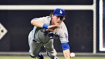 Aug 17, 2016; Philadelphia, PA, USA; Los Angeles Dodgers right fielder Josh Reddick (11) dives for foul ball but can