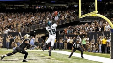 November 5, 2012; New Orleans, LA, USA; Philadelphia Eagles wide receiver Jeremy Maclin (18) is unable to hold on to a pass in the endzone as New Orleans Saints cornerback Patrick Robinson (21) defends during the third quarter of a game at the Mercedes-Benz Superdome. The Saints defeated the Easgles 28-13. Mandatory Credit: Derick E. Hingle-USA TODAY Sports