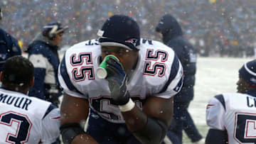 ORCHARD PARK, NY - DECEMBER 11: Willie McGinest #55 of the New England Patriots rests on the sideline during the game with the Buffalo Bills on December 11, 2005 at Ralph Wilson Stadium in Orchard Park, New York. The Pats won 35-7. (Photo by Rick Stewart/Getty Images)