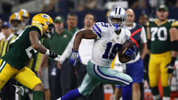 ARLINGTON, TEXAS - OCTOBER 06: Amari Cooper #19 of the Dallas Cowboys makes a touchdown pass reception against Jaire Alexander #23 of the Green Bay Packers in the fourth quarter at AT&T Stadium on October 06, 2019 in Arlington, Texas. (Photo by Ronald Martinez/Getty Images)