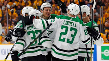 NASHVILLE, TENNESSEE - APRIL 10: Roope Hintz #24, Roope Hintz #24, and Justin Dowling #37 of the Dallas Stars congratulate teammate Miro Heiskanen #4 on scoring a goal against the Nashville Predators during the second period in Game One of the Western Conference First Round during the 2019 NHL Stanley Cup Playoffs at Bridgestone Arena on April 10, 2019 in Nashville, Tennessee. (Photo by Frederick Breedon/Getty Images)