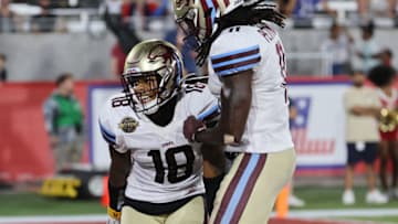 BIRMINGHAM, ALABAMA - MAY 21: Devin Ross #18 of the Michigan Panthers celebrates scoring a touchdown with La'Michael Pettway #11 in the third quarter of the game Birmingham Stallions at Protective Stadium on May 21, 2022 in Birmingham, Alabama. (Photo by Andy Lyons/USFL/Getty Images)