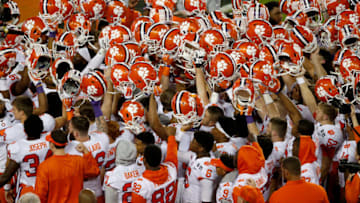 TAMPA, FL - JANUARY 09: The Clemson Tigers huddle before taking on the Alabama Crimson Tide in the 2017 College Football Playoff National Championship Game at Raymond James Stadium on January 9, 2017 in Tampa, Florida. (Photo by Brian Blanco/Getty Images)