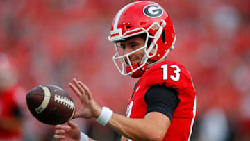ATHENS, GA - SEPTEMBER 18: Stetson Bennett #13 of the Georgia Bulldogs warms up prior to the game against the South Carolina Gamecocks at Sanford Stadium on September 18, 2021 in Athens, Georgia. (Photo by Todd Kirkland/Getty Images)