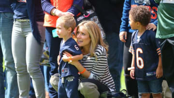 Sep 13, 2015; Chicago, IL, USA; Kristin Cavallari and son Camden watch husband Chicago Bears quarterback Jay Cutler (not pictured) warm up prior to a game against the Green Bay Packers at Soldier Field. Mandatory Credit: Dennis Wierzbicki-USA TODAY Sports