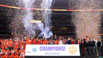 ARLINGTON, TEXAS - DECEMBER 29: The Clemson Tigers celebrate with the trophy after defeating the Notre Dame Fighting Irish during the College Football Playoff Semifinal Goodyear Cotton Bowl Classic at AT&T Stadium on December 29, 2018 in Arlington, Texas. Clemson defeated Notre Dame 30-3. (Photo by Tom Pennington/Getty Images)