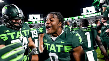 Michigan State's Kenneth Walker III celebrates with teammates after beating Maryland on Saturday, Nov. 13, 2021, at Spartan Stadium in East Lansing.211113 Msu Maryland 199a