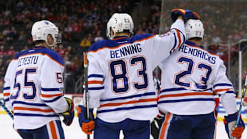 Jan 7, 2017; Newark, NJ, USA; Edmonton Oilers center Mark Letestu (55) and defenseman Matthew Benning (83) and left wing Matt Hendricks (23) celebrate Benning