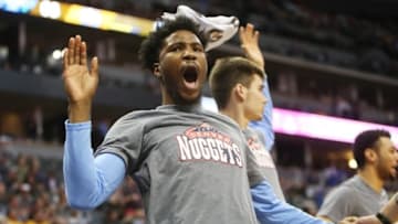 Nov 12, 2016; Denver, CO, USA; Denver Nuggets guard Malik Beasley (25) reacts from the bench during the second half against the Detroit Pistons at Pepsi Center. The Pistons won 106-95. Mandatory Credit: Chris Humphreys-USA TODAY Sports
