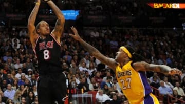 Jan 23, 2014; Miami, FL, USA; Miami Heat small forward Michael Beasley (8) shoots over Los Angeles Lakers power forward Jordan Hill (27) during the second half at American Airlines Arena. Mandatory Credit: Steve Mitchell-USA TODAY Sports