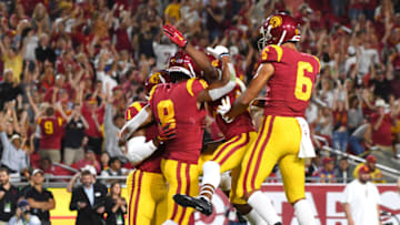 LOS ANGELES, CA - SEPTEMBER 07: Wide receiver Amon-Ra St. Brown #8 of the USC Trojans celebrates with Velus Jones Jr. #1, Tyler Vaughns #21 and Michael Pittman Jr. #6 after a touch down in the first half of the game against the Stanford Cardinal at the Los Angeles Memorial Coliseum on September 7, 2019 in Los Angeles, California. (Photo by Jayne Kamin-Oncea/Getty Images)