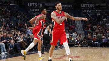 NEW OREANS, LA - OCTOBER 28: Nickeil Alexander-Walker #0 and Lonzo Ball #2 of the New Orleans Pelicans celebrate a basket against the Golden State Warriors on October 28, 2019 at the Smoothie King Center in New Orleans, Louisiana. NOTE TO USER: User expressly acknowledges and agrees that, by downloading and or using this Photograph, user is consenting to the terms and conditions of the Getty Images License Agreement. Mandatory Copyright Notice: Copyright 2019 NBAE (Photo by Jeff Haynes/NBAE via Getty Images)