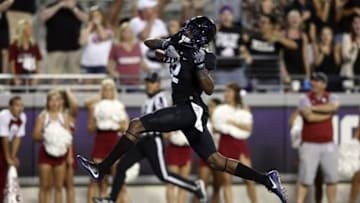 Oct 1, 2016; Fort Worth, TX, USA; TCU Horned Frogs wide receiver Taj Williams (2) scores a touchdown during the second half against the Oklahoma Sooners at Amon G. Carter Stadium. Mandatory Credit: Kevin Jairaj-USA TODAY Sports