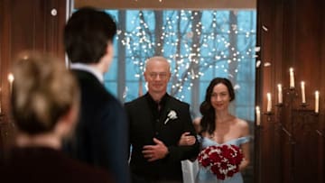 Legends of Tomorrow -- "Mr. Parker's Cul-De-Sac" -- Image Number: LGN506b_0552b.jpg -- Pictured (L-R): Neal McDonough as Damien Darhk and Courtney Ford as Nora Darhk -- Photo: Michael Courtney/The CW -- © 2020 The CW Network, LLC. All Rights Reserved.