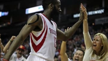 Dec 22, 2014; Houston, TX, USA; Houston Rockets guard James Harden (13) is congratulated by fans after making a basket during the second quarter against the Portland Trail Blazers at Toyota Center. Mandatory Credit: Troy Taormina-USA TODAY Sports