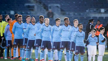 NEW YORK, NEW YORK - March 11: The New York City FC team during the national anthem during the New York City FC Vs LA Galaxy regular season MLS game at Yankee Stadium on March 11, 2018 in New York City. (Photo by Tim Clayton/Corbis via Getty Images)