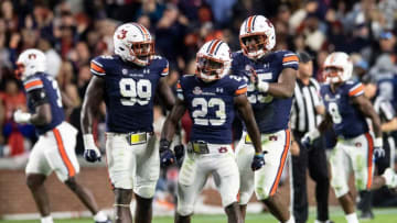 Auburn football celebrates after stoping a fumbled field goal snap during the Iron Bowl at Jordan-Hare Stadium in Auburn, Ala., on Saturday, Nov. 27, 2021. Alabama Crimson Tide defeated Auburn Tigers 24-22 in 4OT.