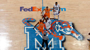 MEMPHIS, TN - FEBRUARY 23: Robert Dozier #2 of the Memphis Tigers jumps against Tyler Smith #1 of the Tennessee Volunteers at FedExForum on February 23, 2008 in Memphis, Tennessee. (Photo by Joe Murphy/Getty Images)