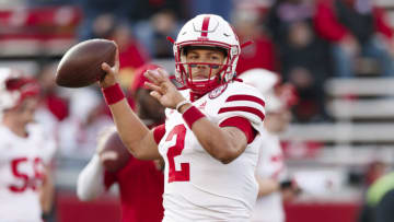 Auburn footballNov 20, 2021; Madison, Wisconsin, USA; Nebraska Cornhuskers quarterback Adrian Martinez (2) throws a pass during warmups prior to the game against the Wisconsin Badgers at Camp Randall Stadium. Mandatory Credit: Jeff Hanisch-USA TODAY Sports