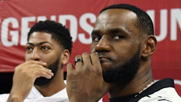 LAS VEGAS, NEVADA - JULY 06: Anthony Davis (L) and LeBron James of the Los Angeles Lakers arrive at a game between the Lakers and the LA Clippers during the 2019 NBA Summer League at the Thomas & Mack Center on July 6, 2019 in Las Vegas, Nevada. NOTE TO USER: User expressly acknowledges and agrees that, by downloading and or using this photograph, User is consenting to the terms and conditions of the Getty Images License Agreement. (Photo by Ethan Miller/Getty Images)