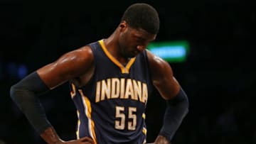 Mar 31, 2015; Brooklyn, NY, USA; Indiana Pacers center Roy Hibbert (55) reacts against the Brooklyn Nets during the second half at Barclays Center. The Nets defeated the Pacers 111 - 106. Mandatory Credit: Adam Hunger-USA TODAY Sports